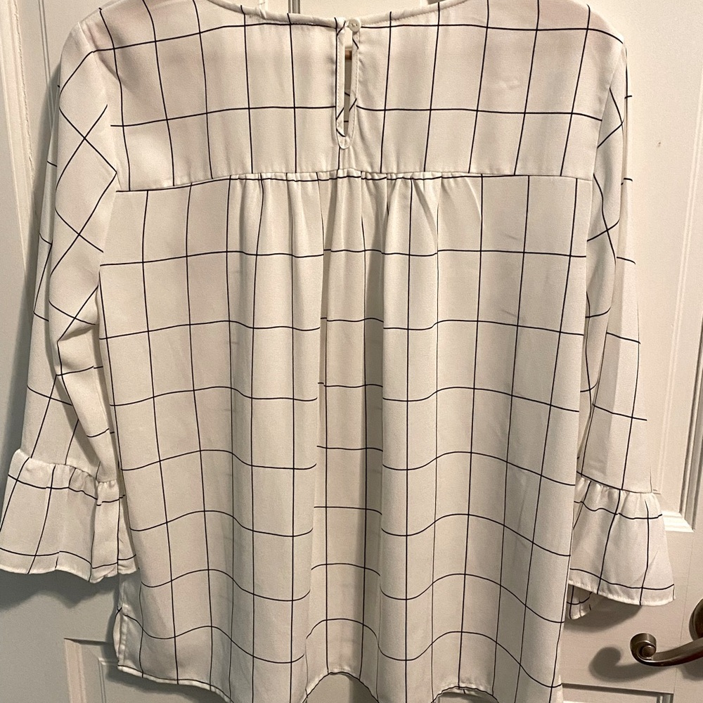 Adrianna Papell’s black & white window pane top with flutter sleeves